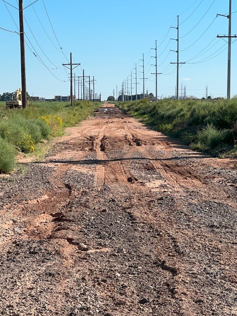 Unpaved portion of Quaker Avenue in Lubbock, Texas