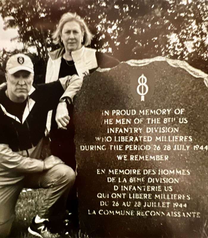 Mike Standefer and his sister Valarie Zeeck at a memorial to their dad’s 8th Infantry who liberated the town of Millieres.