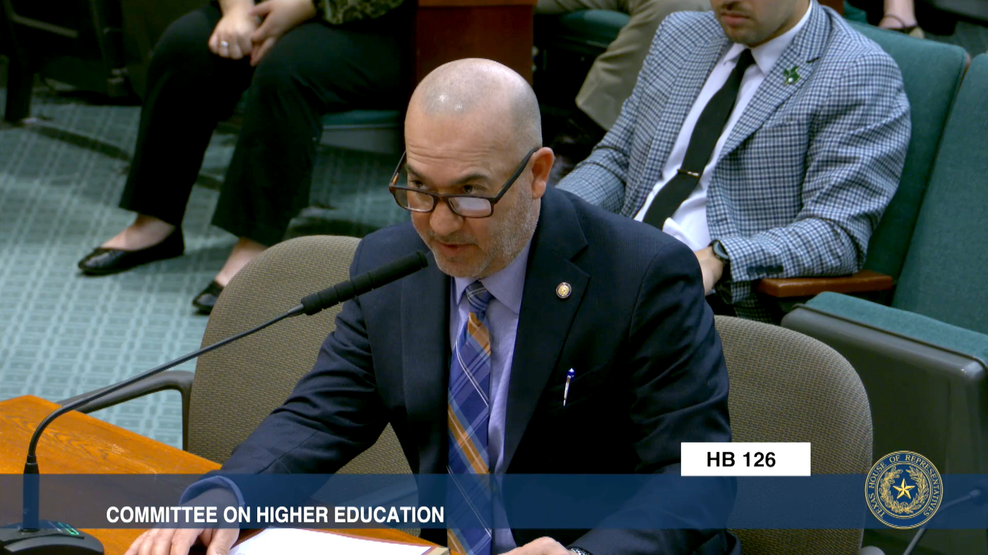 Carl Tepper in front of the House Higher Education Committee